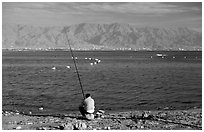 Fishing in the Red Sea, Eilat. Negev Desert, Israel (black and white)