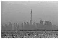 Dubai skyline with Burj Khalifa above Persian Gulf, sunrise. United Arab Emirates ( black and white)
