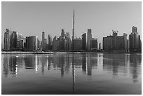 Downtown skyline reflected in Dubai Creek. United Arab Emirates ( black and white)