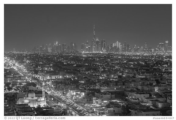 Jumerah Beach Road and downtown skyline at night. United Arab Emirates (black and white)