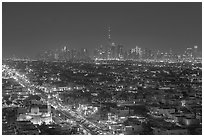 Jumerah Beach Road and downtown skyline at night. United Arab Emirates ( black and white)