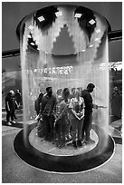 Visitors behind curtain of water, Saudi Arabia Pavilion. Expo 2020, Dubai, United Arab Emirates ( black and white)