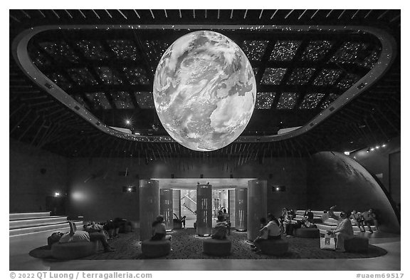 Visitors watch horizontal media show, USA Pavilion. Expo 2020, Dubai, United Arab Emirates (black and white)