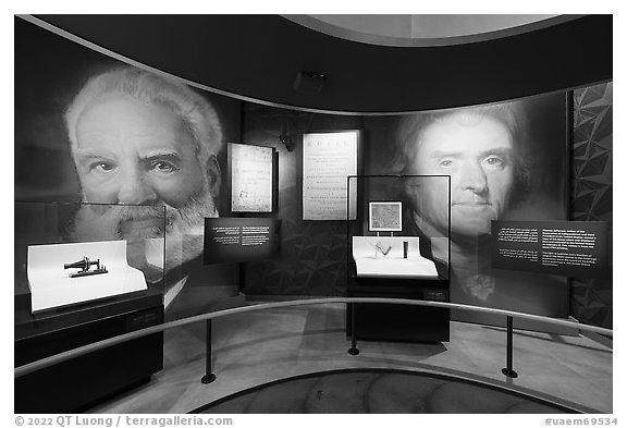 Alexander Graham with first phone and Thomas Jefferson with copy of Koran, USA Pavilion. Expo 2020, Dubai, United Arab Emirates (black and white)