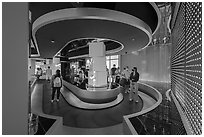 Visitors on moving walkway, Exhibit 3, USA Pavilion. Expo 2020, Dubai, United Arab Emirates ( black and white)