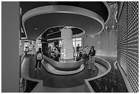 Visitors on moving walkway, Exhibit 3, USA Pavilion. Expo 2020, Dubai, United Arab Emirates ( black and white)