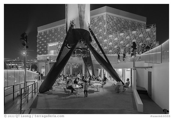 Booster rocket on landing legs and pavilion, USA Pavilion. Expo 2020, Dubai, United Arab Emirates