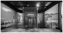 Upper floor of Exhibit 5 with elevator in middle, USA Pavilion. Expo 2020, Dubai, United Arab Emirates ( black and white)