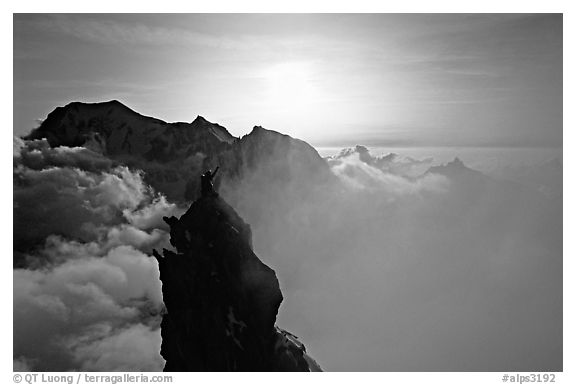 On the very narrow top of Dent du Geant, Mont-Blanc Range, Alps, France.