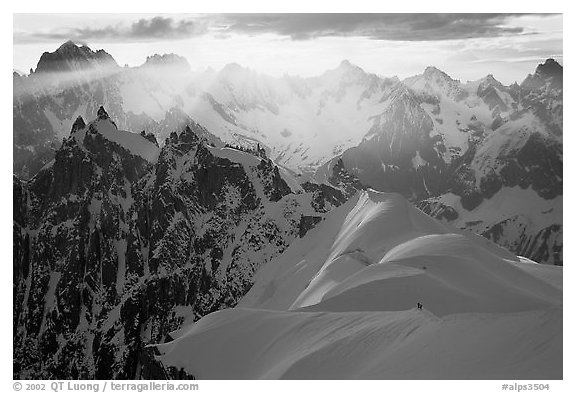 Alpinists on the Aiguille du Midi ridge. Alps, France