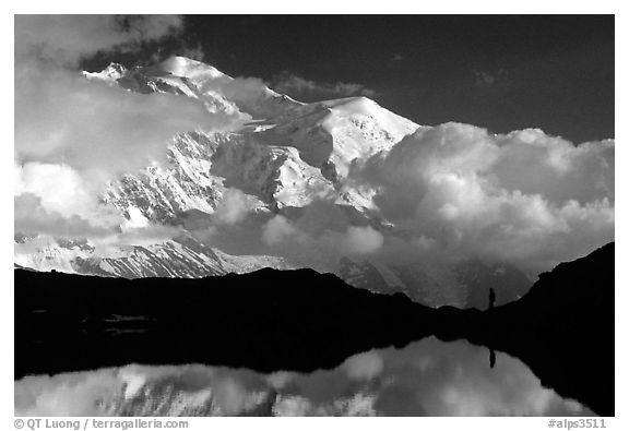 Hiker in the Aiguilles Rouges and Mont-Blanc range, Alps, France.