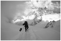 Alpinists climb  Aiguille du Midi, France. (black and white)
