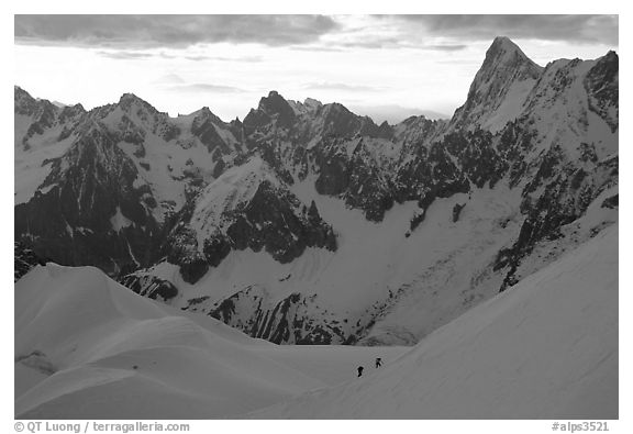 Alpinists climb Aiguille du Midi, France.