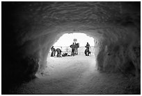Ice tunnel leading to the ridge exiting Aiguille du Midi. Alps, France (black and white)