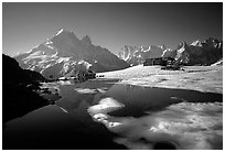Mountain hut at Lac Blanc and Mont-Blanc range, Alps, France. (black and white)