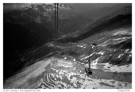 Cable car to Aiguille du Midi, Chamonix Valley in below. Alps, France