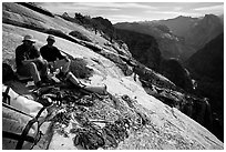Valerio Folco and Tom McMillan with gear at the top of the wall. El Capitan, Yosemite, California (black and white)