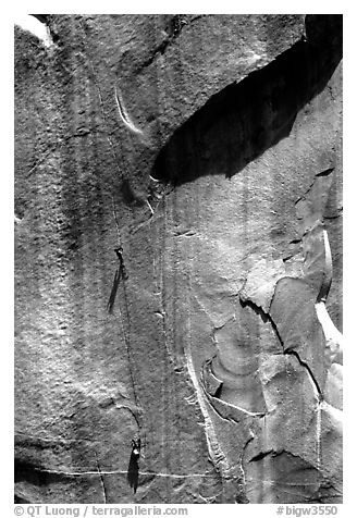 Party on  the Triple Cracks, the crux of the route. El Capitan, Yosemite, California