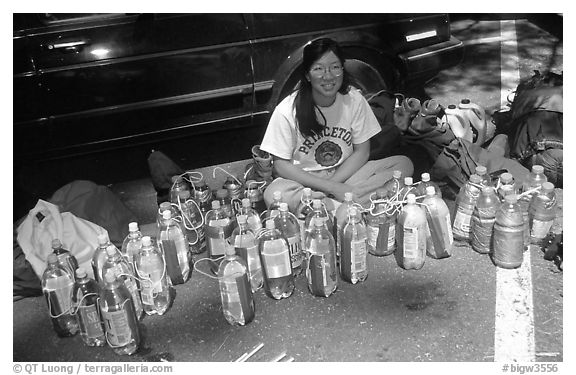 Climber and water bottles needed for an ascent of Mescalito. Yosemite, California