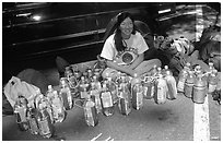 Climber and water bottles needed for an ascent of Mescalito. Yosemite, California (black and white)