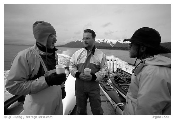 Kayakers in dry suits on the deck of Glacier Bay Lodge concession boat. Glacier Bay National Park, Alaska