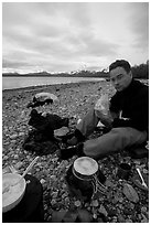 Eating on the shores of Muir Inlet. Glacier Bay National Park, Alaska (black and white)