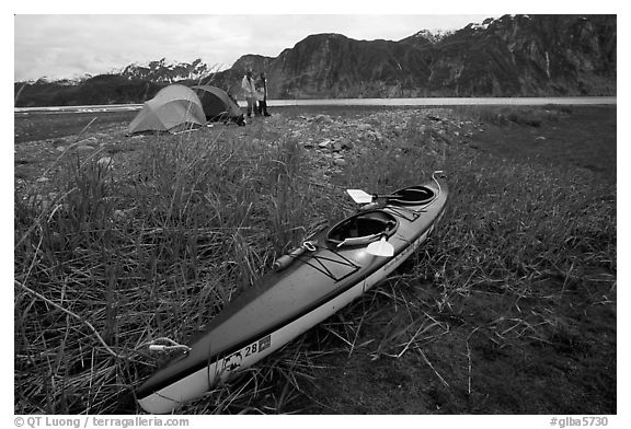 Camp on the flats near McBride Glacier with kayak parked nearby. Glacier Bay National Park, Alaska