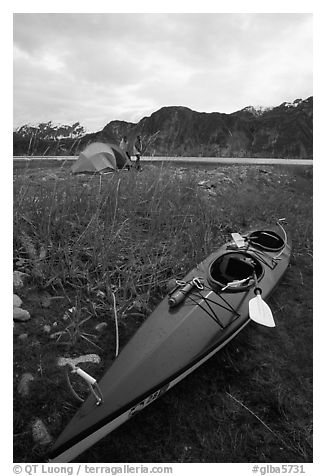 Camp on the flats near McBride Glacier with kayak parked nearby. Glacier Bay National Park, Alaska