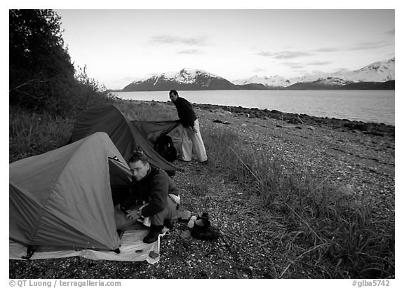 Kayakers getting into their tents for the night,  East Arm. Glacier Bay National Park, Alaska