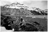 Eating in front of Lamplugh Glacier. Glacier Bay National Park, Alaska (black and white)