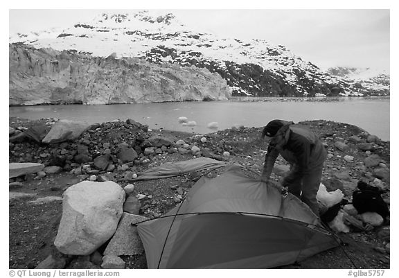 Setting up a tent in front of Lamplugh Glacier. Glacier Bay National Park, Alaska