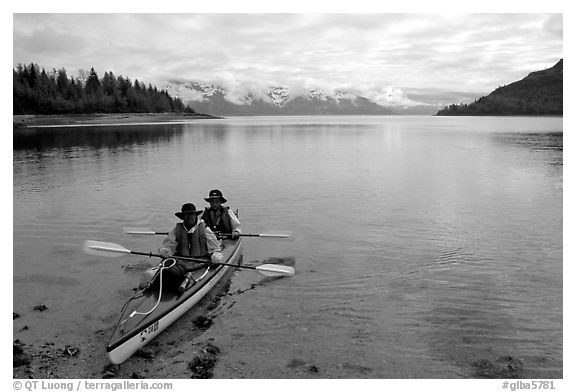 Kayakers land in Hugh Miller Inlet. Glacier Bay National Park, Alaska