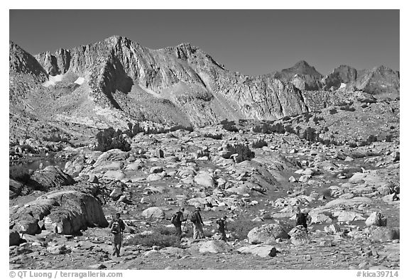Hikers in Dusy Basin, morning. Kings Canyon National Park, California