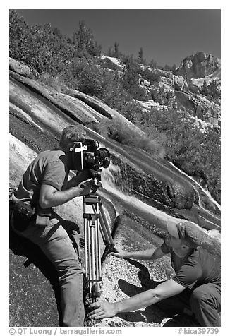 Men filming a waterfall, lower Dusy Basin. Kings Canyon National Park, California