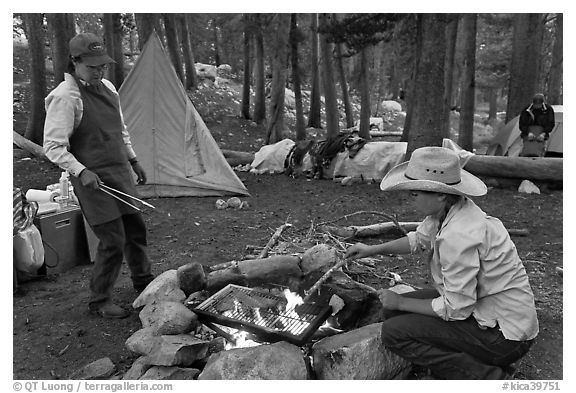 Women preparing food at camp, Le Conte Canyon. Kings Canyon National Park, California