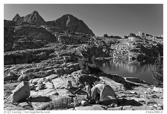 Breaking camp near lake, Dusy Basin. Kings Canyon National Park, California