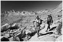 Hikers on trail below Biship Pass, Dusy Basin. Kings Canyon National Park, California (black and white)
