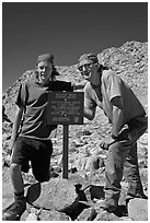 Father and son standing next to Bishop Pass sign. Kings Canyon National Park, California (black and white)