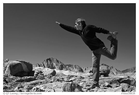 Hiker stretching, Bishop Pass. Kings Canyon National Park, California