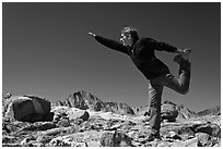 Hiker stretching, Bishop Pass. Kings Canyon National Park, California (black and white)
