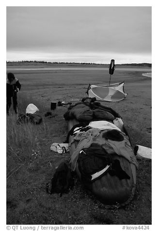 Gear laid out for drying on the bottom of the canoe on a small island of the Kobuk River. Kobuk Valley National Park, Alaska