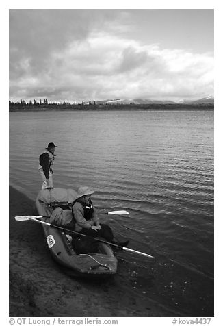 Canoeists ready to lauch with the boat loaded up. Kobuk Valley National Park, Alaska