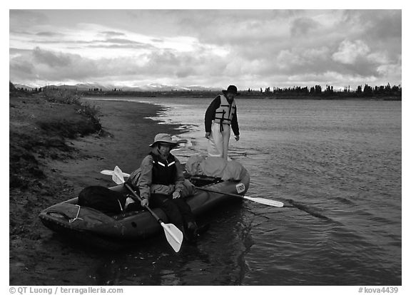 Canoeists ready to lauch with the boat loaded up. Kobuk Valley National Park, Alaska