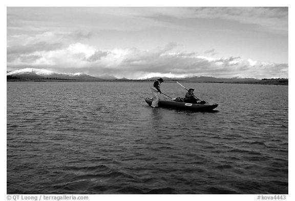 Canoeists on a wide and very shallow stretch of the Kobuk River. Kobuk Valley National Park, Alaska