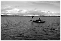 Canoeists on a wide and very shallow stretch of the Kobuk River. Kobuk Valley National Park, Alaska (black and white)