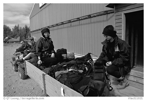 Riding on the trailer with the gear. Lake Clark National Park, Alaska