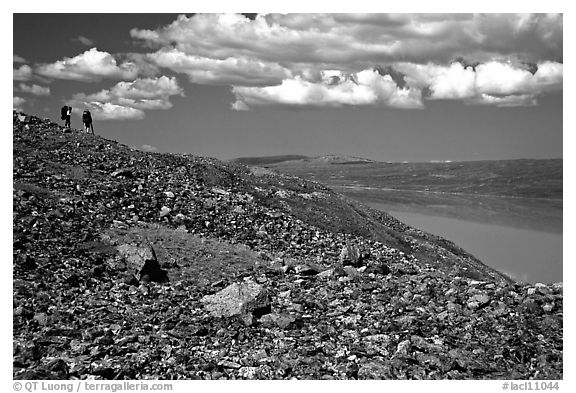 Backpackers on a ridge above Turquoise Lake. Lake Clark National Park, Alaska