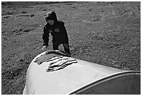 Backpacker drying gear on top of tent. Lake Clark National Park, Alaska (black and white)