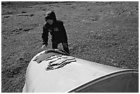 Backpacker drying gear on top of tent. Lake Clark National Park, Alaska (black and white)