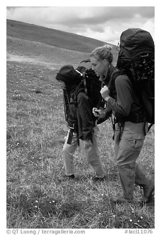 Two backpackers on the tundra. Lake Clark National Park, Alaska